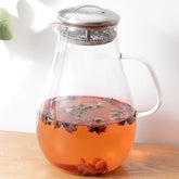 Urbane Home Premium 2 LTR Glass Jug with Stainless Steel Lid and Handle | Leakproof Pitcher for Water, Cold Brew, Tea, Iced Coffee, Lemonade | Heat Resistant | Housewarming Gift | Transparent